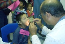 Health Fairs Screen Tots While State Braces for Cuts