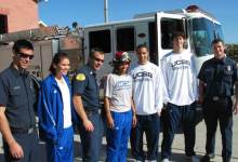 Firemen Show Gauchos Their Version of a Transition Game