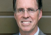 Principal Alleges Religious Discrimination