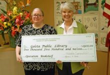Las Aletas Check Helps Local Library