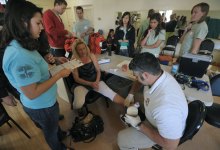 Hundreds of Homeless Have Their Feet Washed