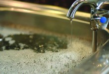Water-Saver: Plastic Bottles Near Sink