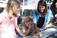 Children Sign MOXI’s Beam