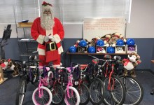 Police Play Santa; Chief Receives Rotary Award