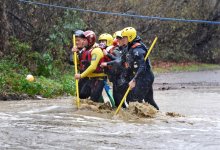 Crew Rescues Woman Trapped Between Flooded Creek Crossings