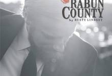 Rusty Lindsay Plays Guitar and Sings