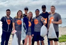 Young Professionals Clean Up The Beach