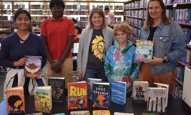 United Way Young Leaders Society Raises over $3,000 to Provide New Books to Four Local Schools