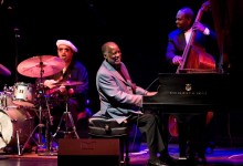 ON the Beat | Milestone Choral Massing, Guitars in Triplicate and a Jazz Master’s Passing