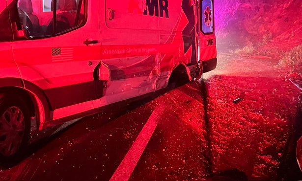 Ambulance Transporting Patient to ER Sideswiped by Vehicle on Highway 154