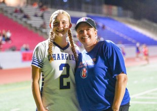 Mother and Daughter Compete on Opposite Sides of Flag Football Rivalry