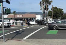 Bystanders Help Man Lying in Center of Hollister Avenue in Old Town Goleta