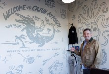 Gator Boy Rides Again: Cajun Kitchen Reopens with Familiar Mural