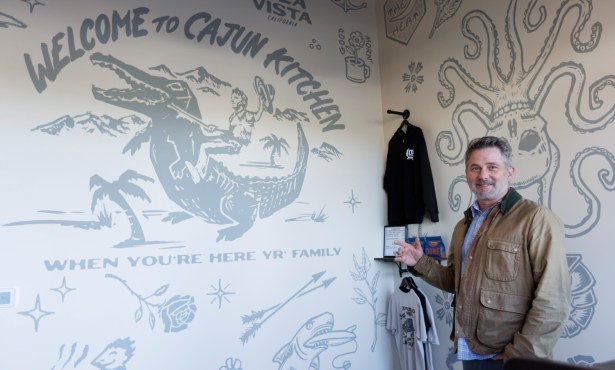 Gator Boy Rides Again: Cajun Kitchen Reopens with Familiar Mural