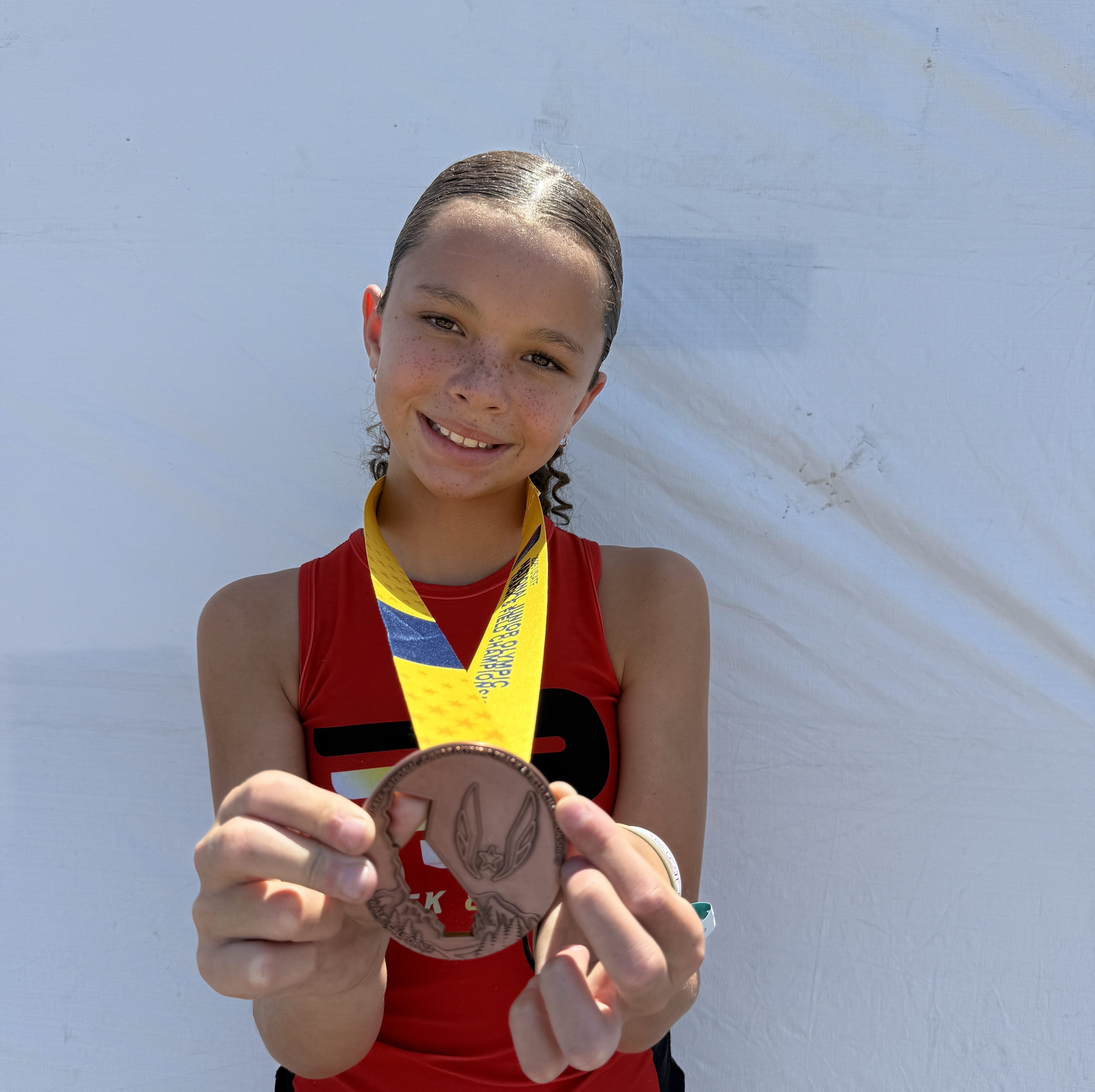 Youth High Jumper Legacy Chapman Medals at USATF Junior Olympics
