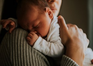 A Mother Held, a Child Safe
