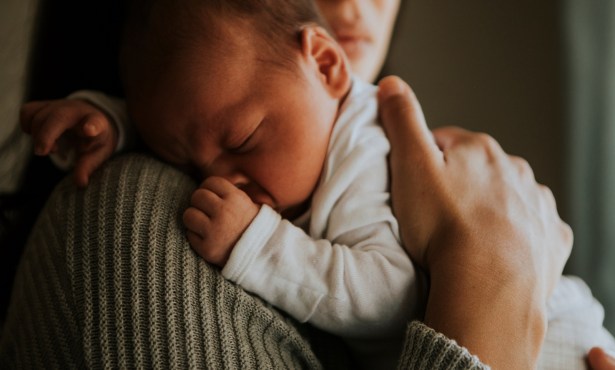 A Mother Held, a Child Safe