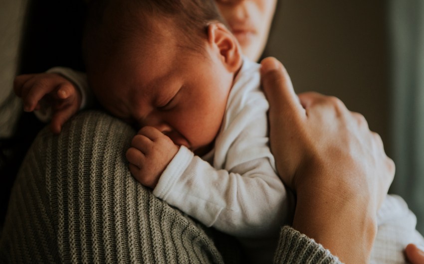 A Mother Held, a Child Safe