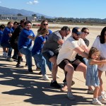 Excitement Soars at Plane Pull for Alpha Resource Center