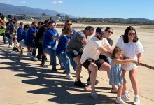 Excitement Soars at Plane Pull for Alpha Resource Center