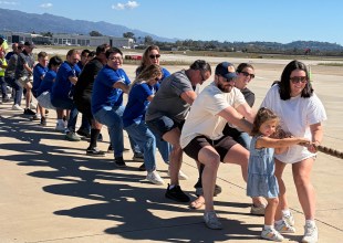 Excitement Soars at Plane Pull for Alpha Resource Center