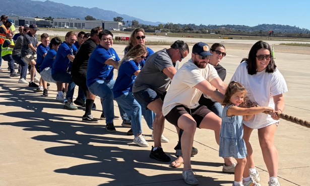 Excitement Soars at Plane Pull for Alpha Resource Center